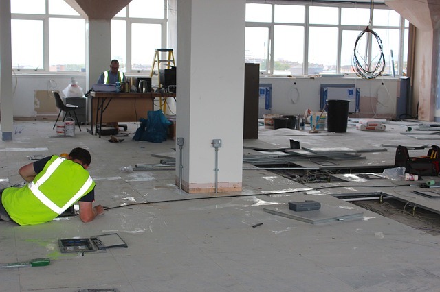 electricians at a construction site working on electrical work