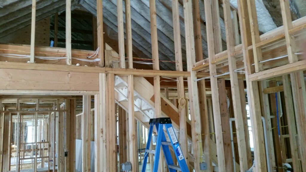 interior view of a unfinished home showing electrical wiring